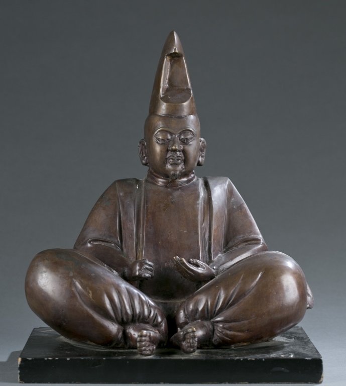A Japanese seated statue of a man. (1 of 4)