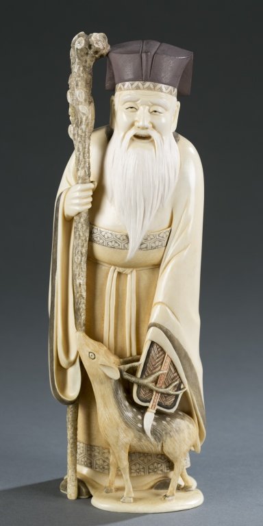 A Japanese ivory okimono of Jurojin with deer. (1 of 9)