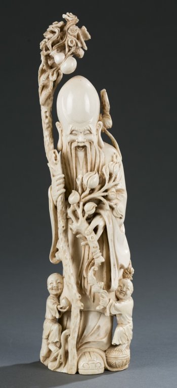 An ivory immortal with children figure. (1 of 10)