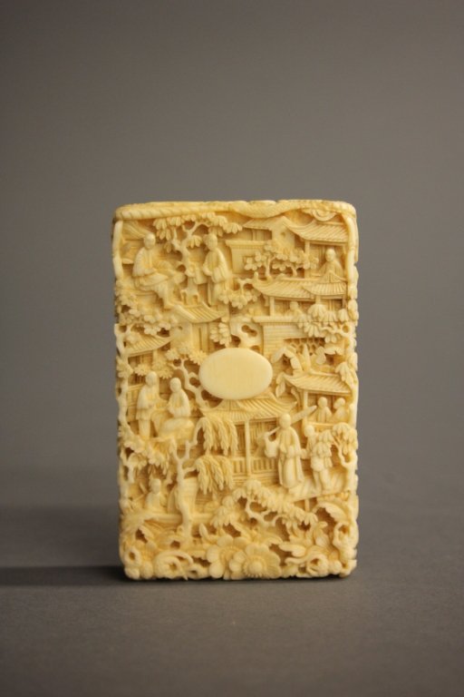 A finely carved ivory cigarette case. (1 of 10)