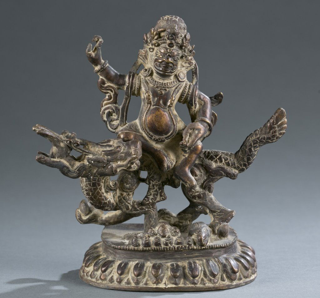 A bronze Dragon-riding Avalokitesvara statue. (1 of 6)