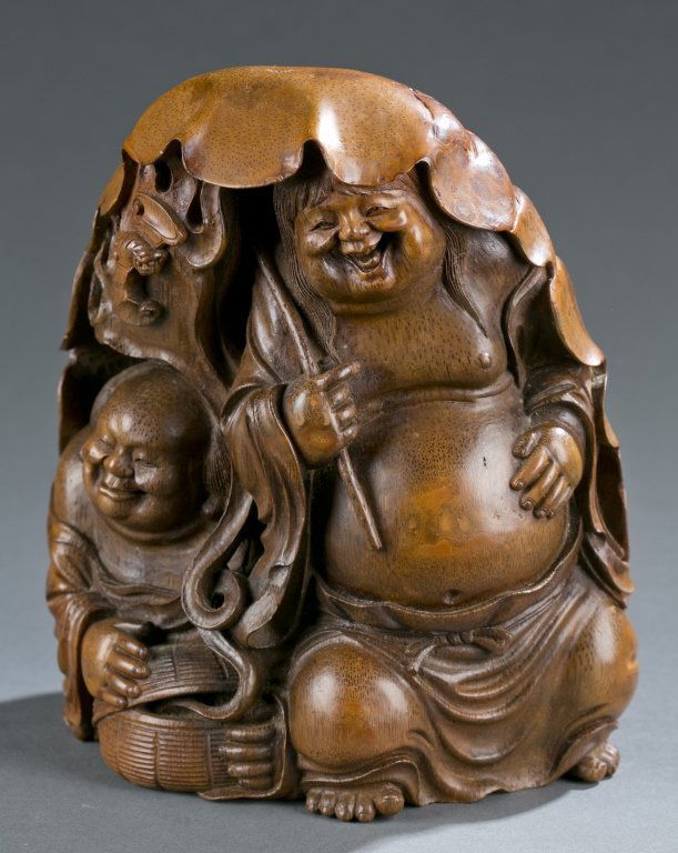 A Chinese bamboo shoot carved figure of immortals. (1 of 5)