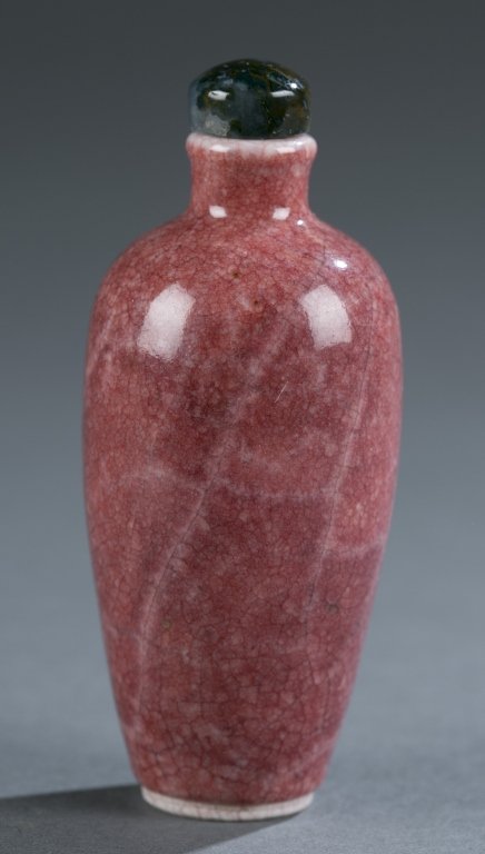 A dusty rose Chinese porcelain snuff bottle. (1 of 5)