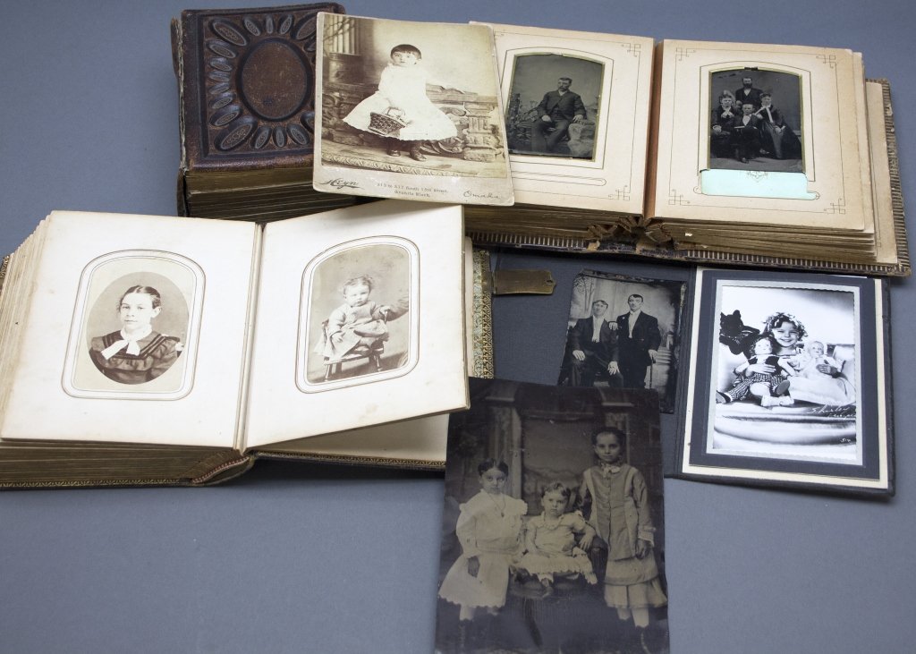 Over 60 photos mostly in 3 albums. Mostly CDVs.: [Albumen/Tintype] Over 60 photographs, mostly in 3 albums, at least 4 are loose. Mostly albumen and tintype family photos, of adults & children. A few bear pencil or ink notation on backing (eg, “Co
