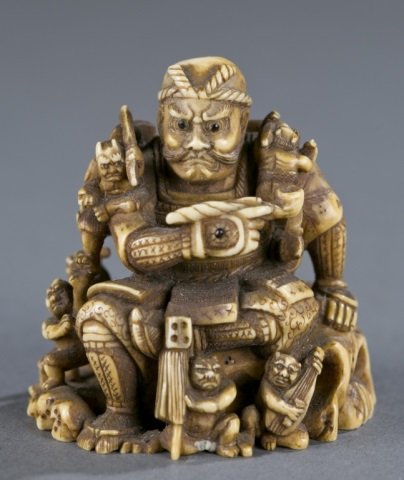 An ivory Okimono style netsuke of Benkei. (1 of 5)