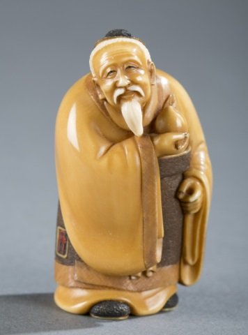 A Japanese ivory katabori netsuke. (1 of 6)