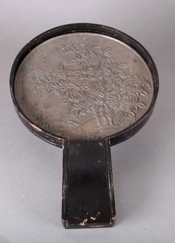A Japanese hand mirror w/original box.: A Japanese hand mirror w/original box. Bronze, extended tang wound with waxed reeds. Decorated with relief trees and fruits design on back. Marked on back: "Tenka ichi Tsuda Satsuma Morinaga Shige". 1