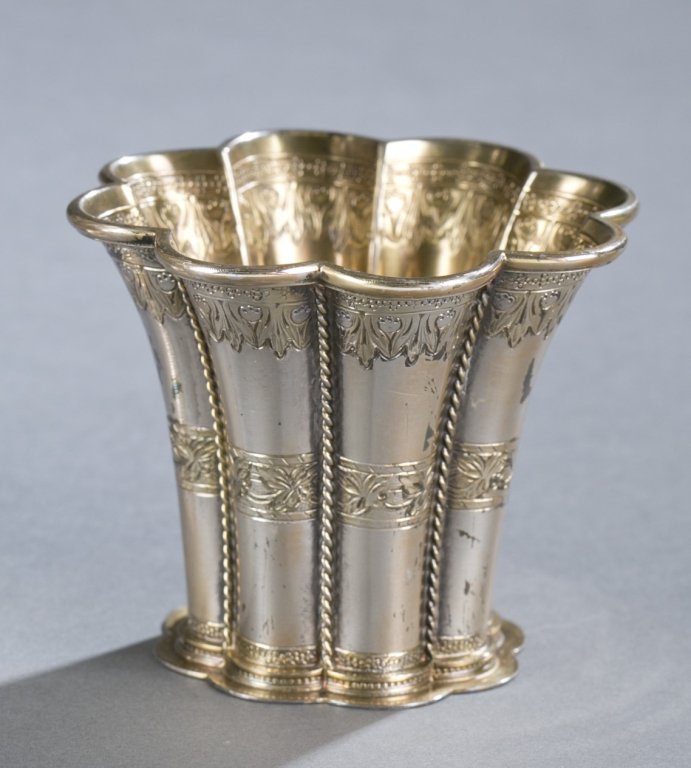 A Svend Toxvaerd Sterling Margrethe cup. c.1950.: A Svend Toxvaerd Sterling Margrethe cup, c.1950. Flared and lobed body with relief design, interior with gold wash. Marked on bottom SvT, STERLING, DENMARK, 925 S. 4.12 t oz. 2 3/4"h.