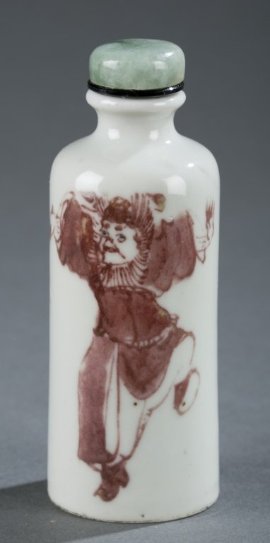 A Chinese porcelain snuff bottle with Zhong Kui. (1 of 4)