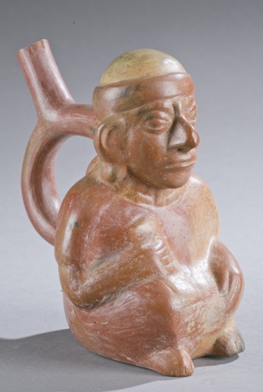 Moche stirrup vessel with seated figure. (1 of 4)