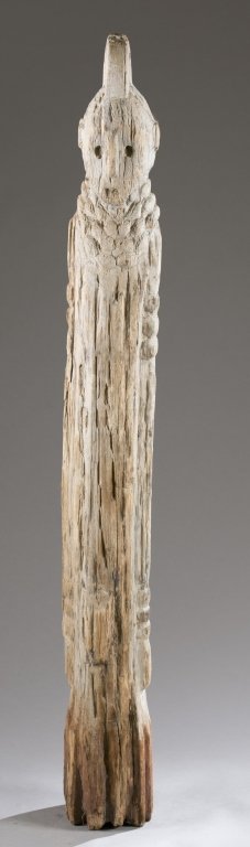 Konso desiccated wooden figure, 20th century.: A white standing male figure of desiccated wood. Kenya, Konso, 20th century. 60"h. Provenance: Collection of Stephen R Primoff, Houston, TX