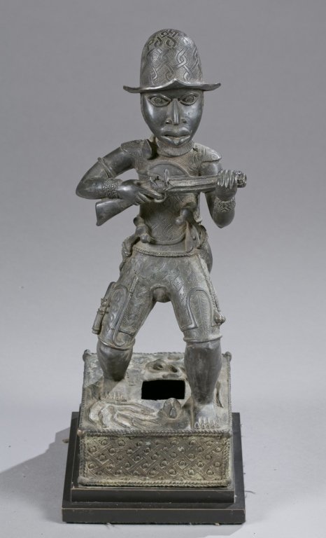 A standing Portuguese figure. 20th century. (1 of 3)