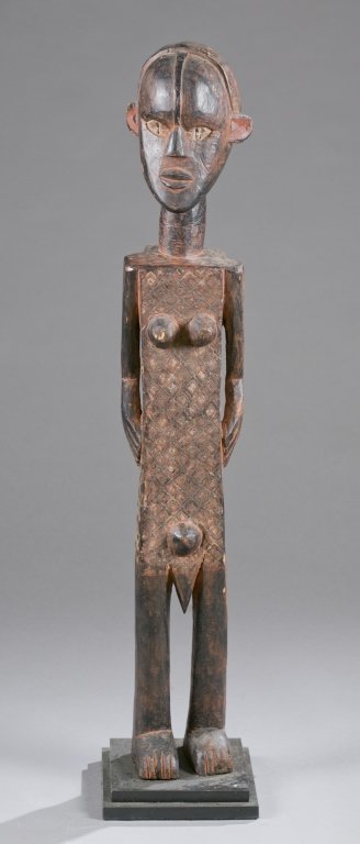 A standing female figure. 20th c. (1 of 4)