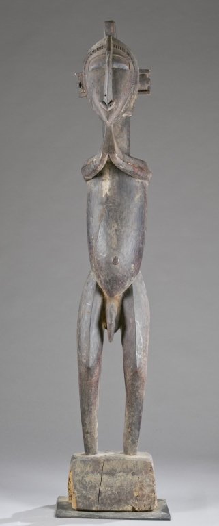 A standing male Nimba figure. 20th c. (1 of 4)