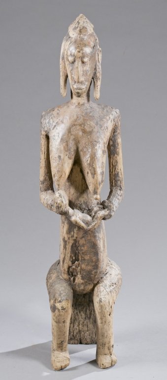 Seated maternity figure, 20th c. (1 of 7)