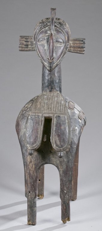 Nimba figure with metal repairs, Pre-1950.: A Nimba figure with metal repairs. Guinea, Baga, Pre-1950. 48"h. Provenance: Collection of Stephen R Primoff, Houston, TX
