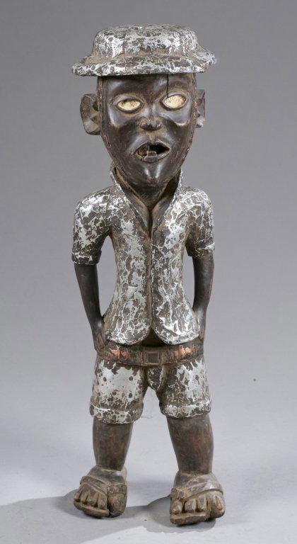 Baule carved colonial figure. 20th c. (1 of 4)