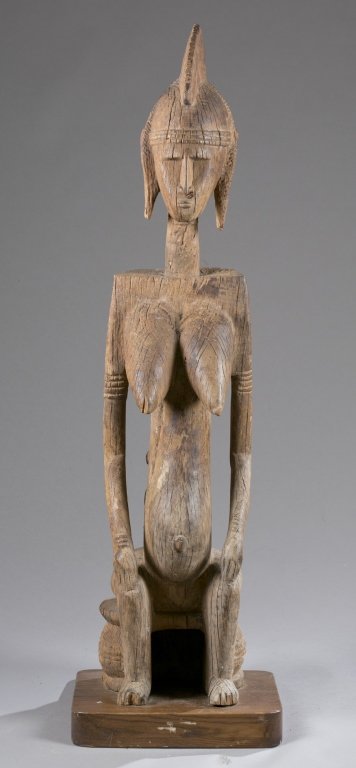 Seated maternity figure, 20th c. (1 of 8)