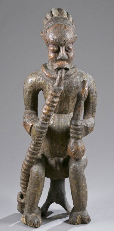 Brass covered seated male figure, 20th c. (1 of 5)