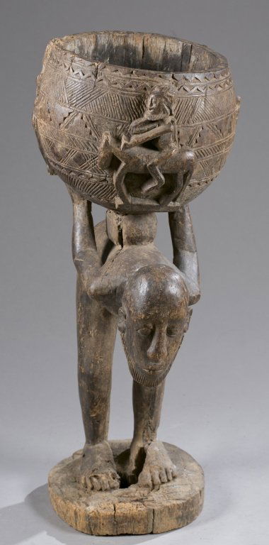 West African bent figure carrying a bowl, 20th c. (1 of 5)