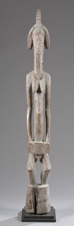 Standing female rhythm pounder figure, 20th c. (1 of 5)