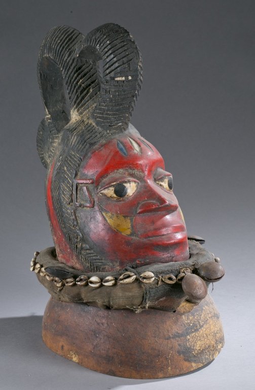 Headdress with red face, 20th c. (1 of 5)