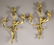 Pair of partial gilt rococo style 3 arm sconces.