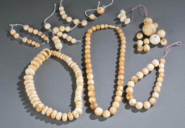 Group of assorted round ivory beads. (1 of 8)