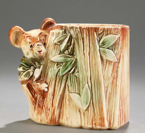 McCoy cookie jar base (no lid), ''Honey Bear,'' 19: McCoy cookie jar base (no lid), ''Honey Bear,'' 1953-55; and McCoy square-shaped cookie jar with V-shaped finial, some paint loss, 1947. This is a live auction at our physical auction gallery, that yo
