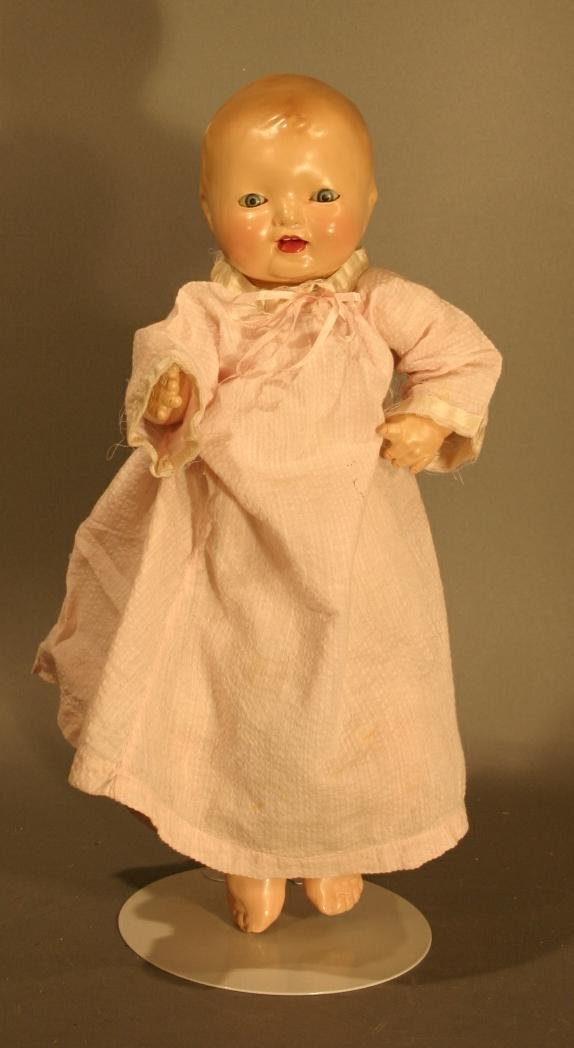 Effanbee Composition Doll, cloth body, sleep eyes,: Effanbee Composition Doll, cloth body, sleep eyes, 16" long. In wooden highchair.