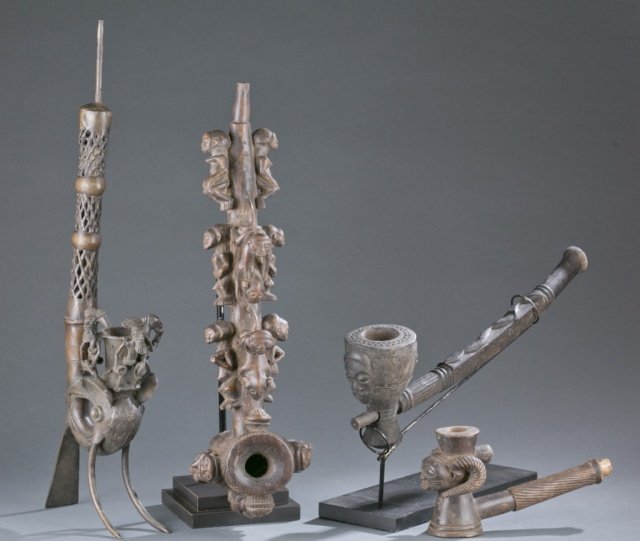 Group of 4 African pipes. (1 of 10)