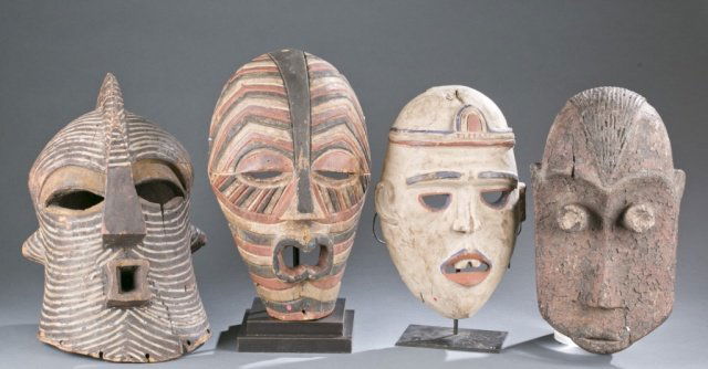 4 African masks. (1 of 9)