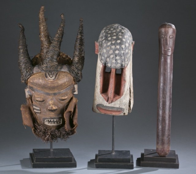 Group of 2 masks and a Janus head figure. (1 of 6)