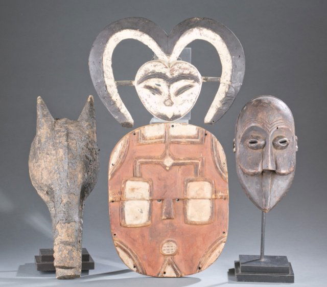 4 African masks. c20th century. (1 of 9)