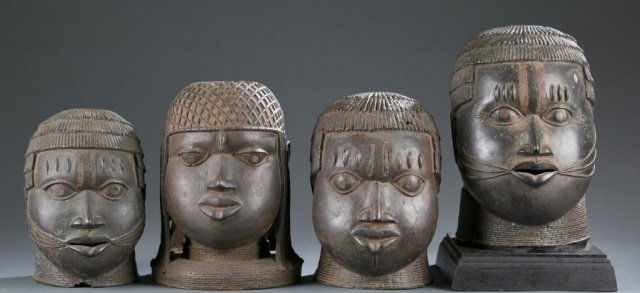4 Brass Oba heads. (1 of 9)