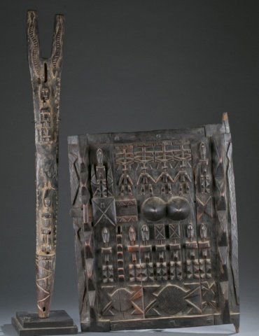 Totemic wooden sculpture, granary door. (1 of 10)