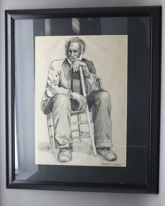 Charcoal Pastel Portrait of Seated Black Man: [Artwork] Framed charcoal and/or pastel portrait on tan paper of seated Black man leaning on a cane. Framed w/ black mat, signed "Betty J. Diedler" lower right. Not examined out of frame. Sight 23 in.