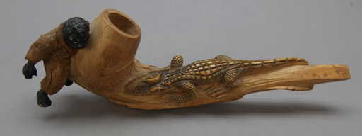 carved wood pipe of
