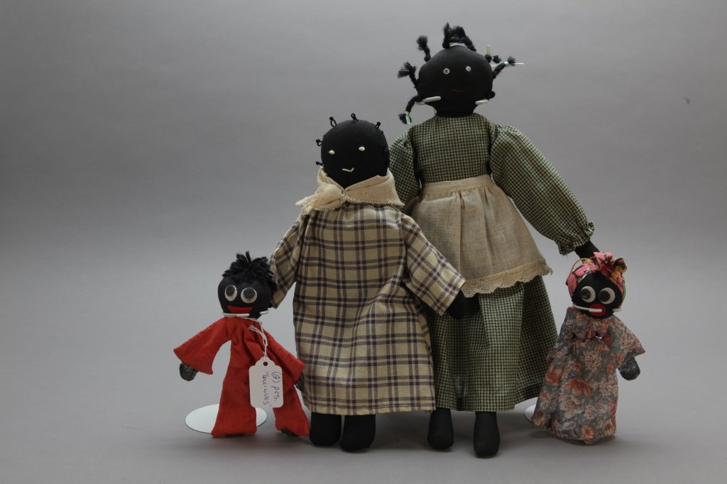 Lot of 4 Black Rag Dolls incl. Mother/Daughter: [Toys/Dolls]. Lot of 4 Black rag dolls in 2 pairs. ++ 2 Mother and Daughter rag dolls with machine and hand sewn dresses, embroidered thread hair and features. One w/ painted features. Mother doll 15"