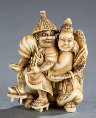 Ivory netsuke of Tadamori & oil thief, Hidemasa. (1 of 7)