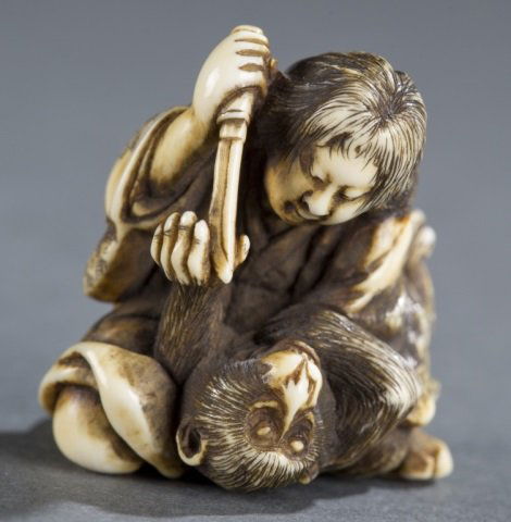 Ivory netsuke of Yamauba and monkey, Gyokusai. (1 of 7)