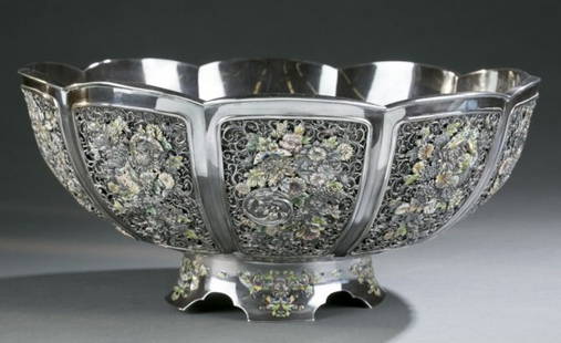 Japanese silver punch bowl w/floral ornament.: A large Japanese silver footed punch bowl. Ten petal floral form. Floral openwork ornament inset on each petal section, depicting different kinds of blossoms and butterflies, with colorful enamel deta