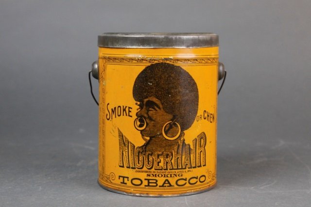 "Nigger Hair" smoking tobacco tin.: A "Nigger Hair" smoking tobacco tin. 7"h.Condition: Overall: Excellent condition.