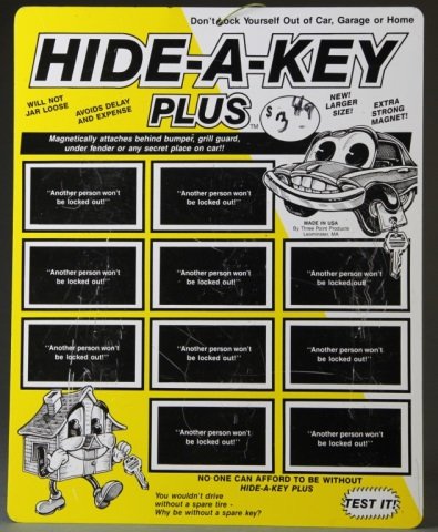 "Hide-A-Key Plus" tin store sign. (1 of 1)