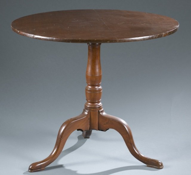 Chippendale mahogany tilt top table, 18th c.: A Chippendale mahogany tilt top table. American. 18th century. 32" diameter top. Condition: Some scratches and old crack to top.