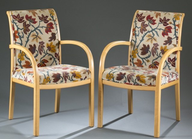 8 Upholstered arm chairs by Jack Lenor Larsen, Inc: A group of 8 Upholstered dining arm chairs by Jack Lenor Larsen, Inc. c.1980s. Blonde wood with upholstered back and seat. Blended fabric upholstery of dark cream color with stylized leaf pattern in b