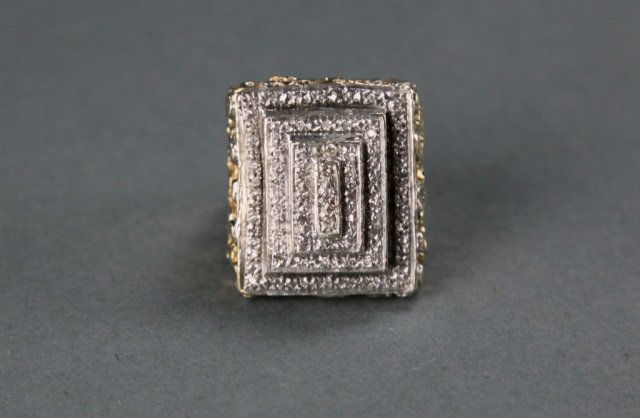 10k yellow gold tiered square top diamond ring.: One 10 karat yellow gold tiered square top diamond nugget style ring, size 12. Weighs 18 grams.