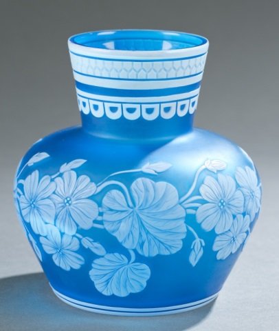 Thomas Webb & Sons blue and white cameo glass vase: A Thomas Webb & Sons blue and white cameo art glass vase. English. With cut overlay floral pattern, and butterfly, linear pattern with gadrooning at top. Late 19th century. Marked on bottom: Thomas We
