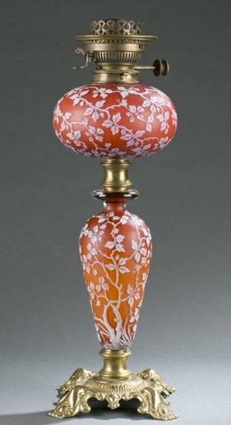 English cameo glass oil lamp, late 19th century.: A cameo art glass oil lamp. Hinks' Benetfink London. English. Late 19th century. Thomas Webb & Sons style glass with orange / red with white cut overlay in flowering tree and butterfly pattern and mix