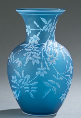 Thomas Webb & Sons blue and white cameo glass vase: A Thomas Webb & Sons blue and white cameo art glass vase. English. Late 19th century. Blue glass body with white cut winter jasmine pattern. Signed on bottom: "Thomas Web & Son Cameo." 7 1/8"h. Condit
